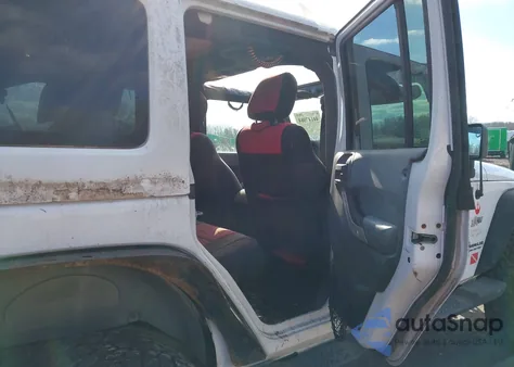 2011 Jeep Wrangler Unlimited Sahara из США, поврежденный, VIN 1J4HA5H10BL602015